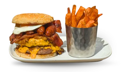 Handmade double brunch burger with sweet potato fries at Revive Cafe Norwich
