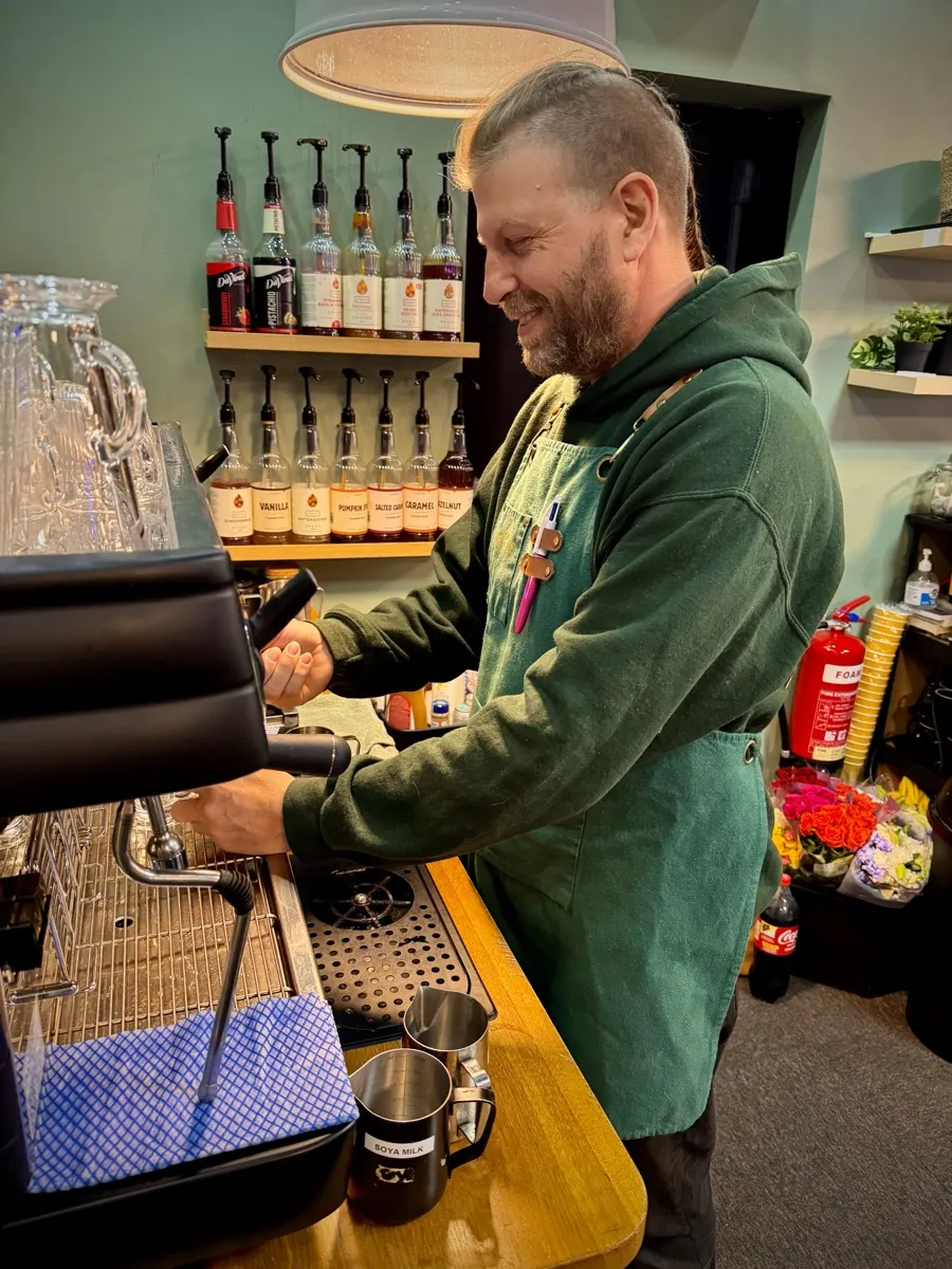 Garry Making Coffee at Revive Cafe Norwich - Friendly Barista Service